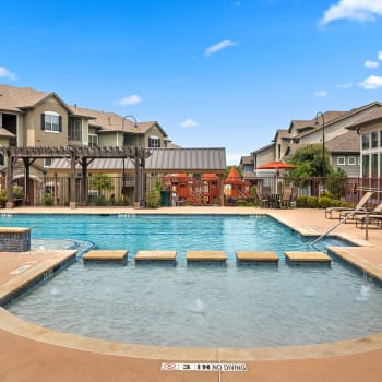 The welcoming community swimming pool at Cypress Creek Joshua Station in Joshua, Texas