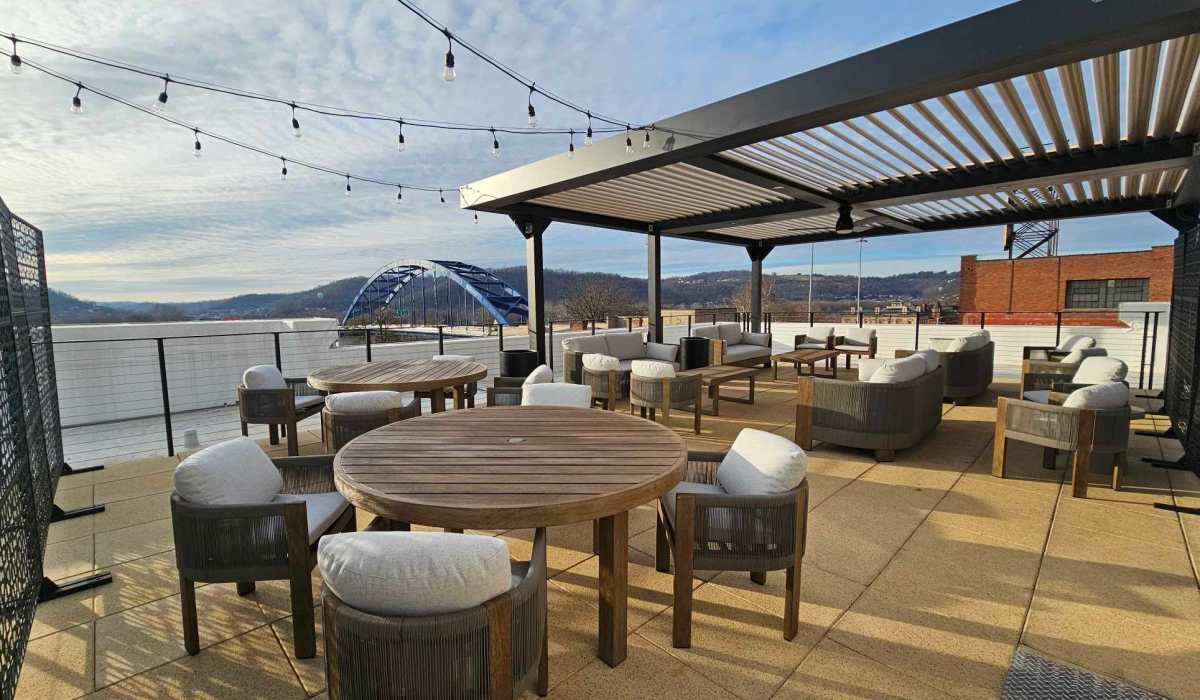 Rooftop terrace with seating at The Doris On Main in Wheeling, West Virginia