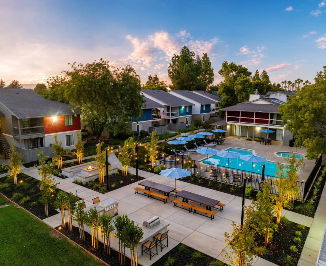 Aerial view of property with pool and seating at  The Mews At Dixon Farms in Dixon, California