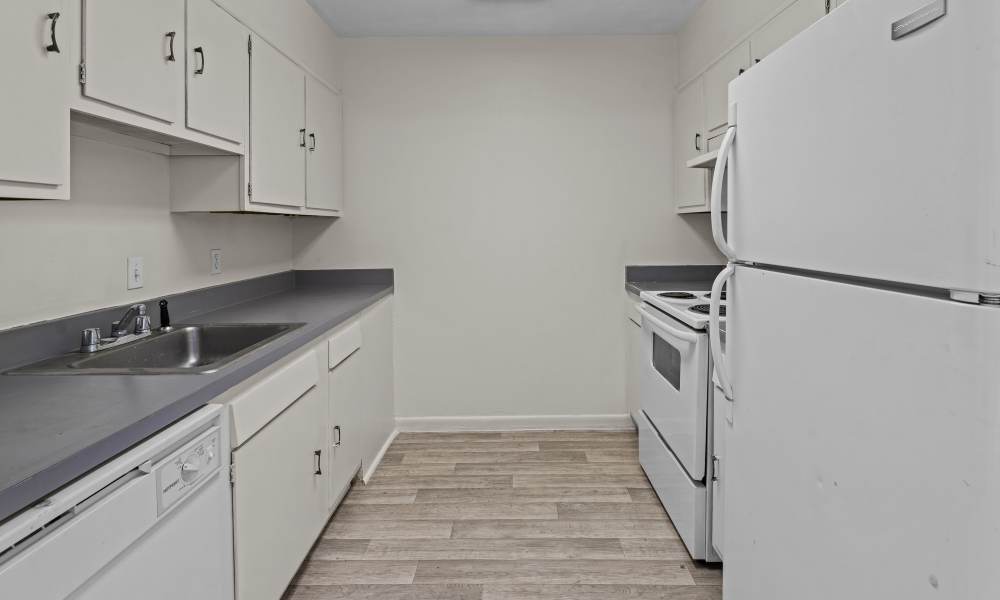 Kitchen with wood-tsyle flooring at Falcon House in Fort Walton Beach,Florida