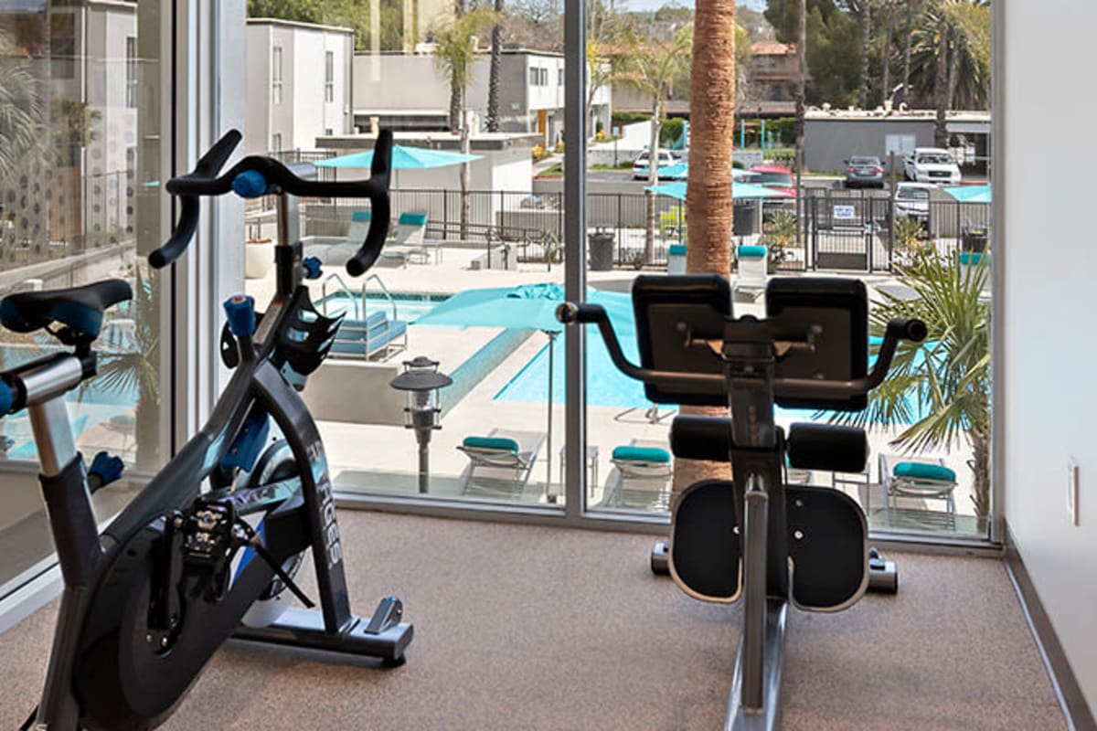 Fitness center overlooking pool at The Retreat at Thousand Oaks, Thousand Oaks, California