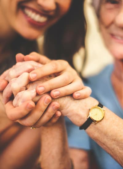 Women holding hands at The Colonial at Historic Camden in Camden, South Carolina