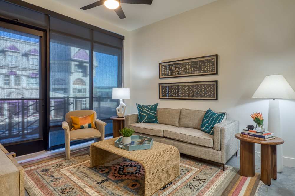 Living room with window access at Fusion at Neon in Norfolk, Virginia