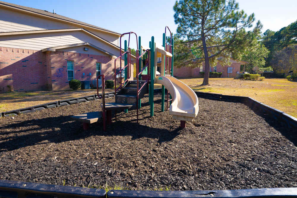 Community playground at Millpoint Townhomes in Henderson, Texas