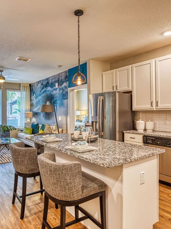 Kitchen with an island at The Parker at Maitland Station, Maitland, Florida