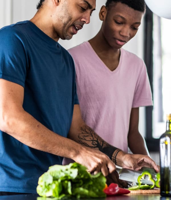two residents cooking together at The Boulders at Fountaingrove in Santa Rosa, California
