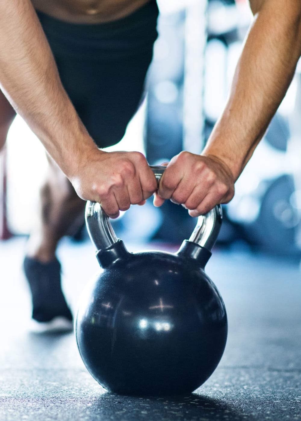 Resident working out in gym at 1869 West in Pittsburgh, Pennsylvania