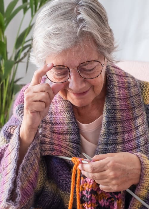 Resident knitting at Grand Villa of Altamonte Springs in Altamonte Springs, Florida