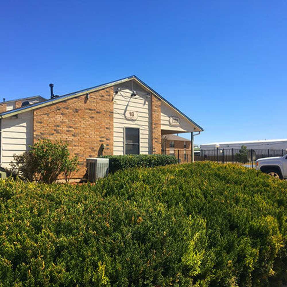 Lush Landscape with community apartment at Cross Timbers At Grand Street in Amarillo, Texas