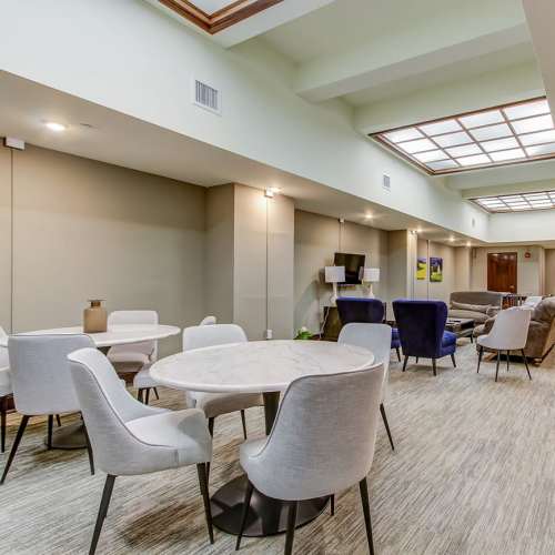Community room with seating at 43 Town Square in Lima, Ohio