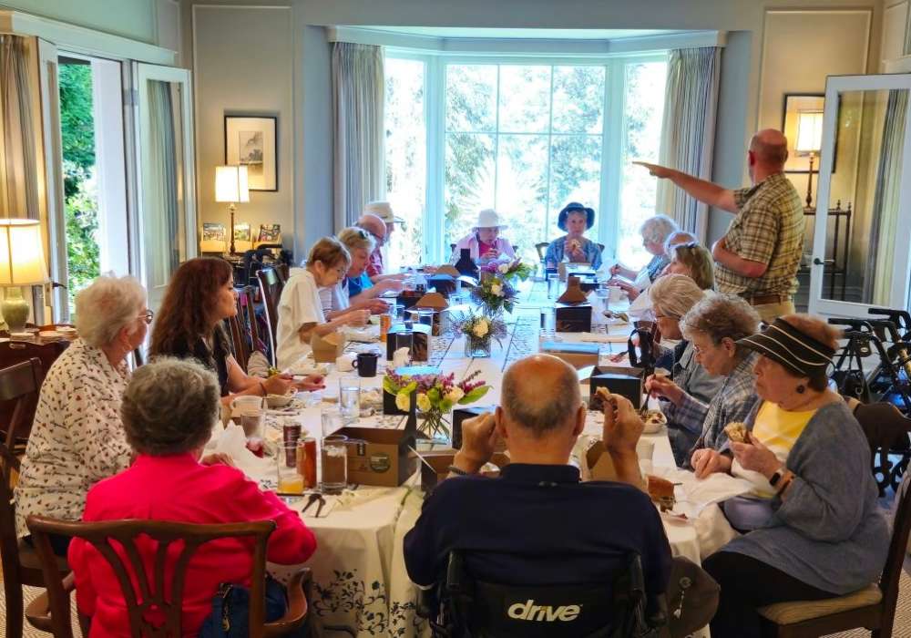 Residents having a meal at Merrill Gardens at The University in Seattle, Washington