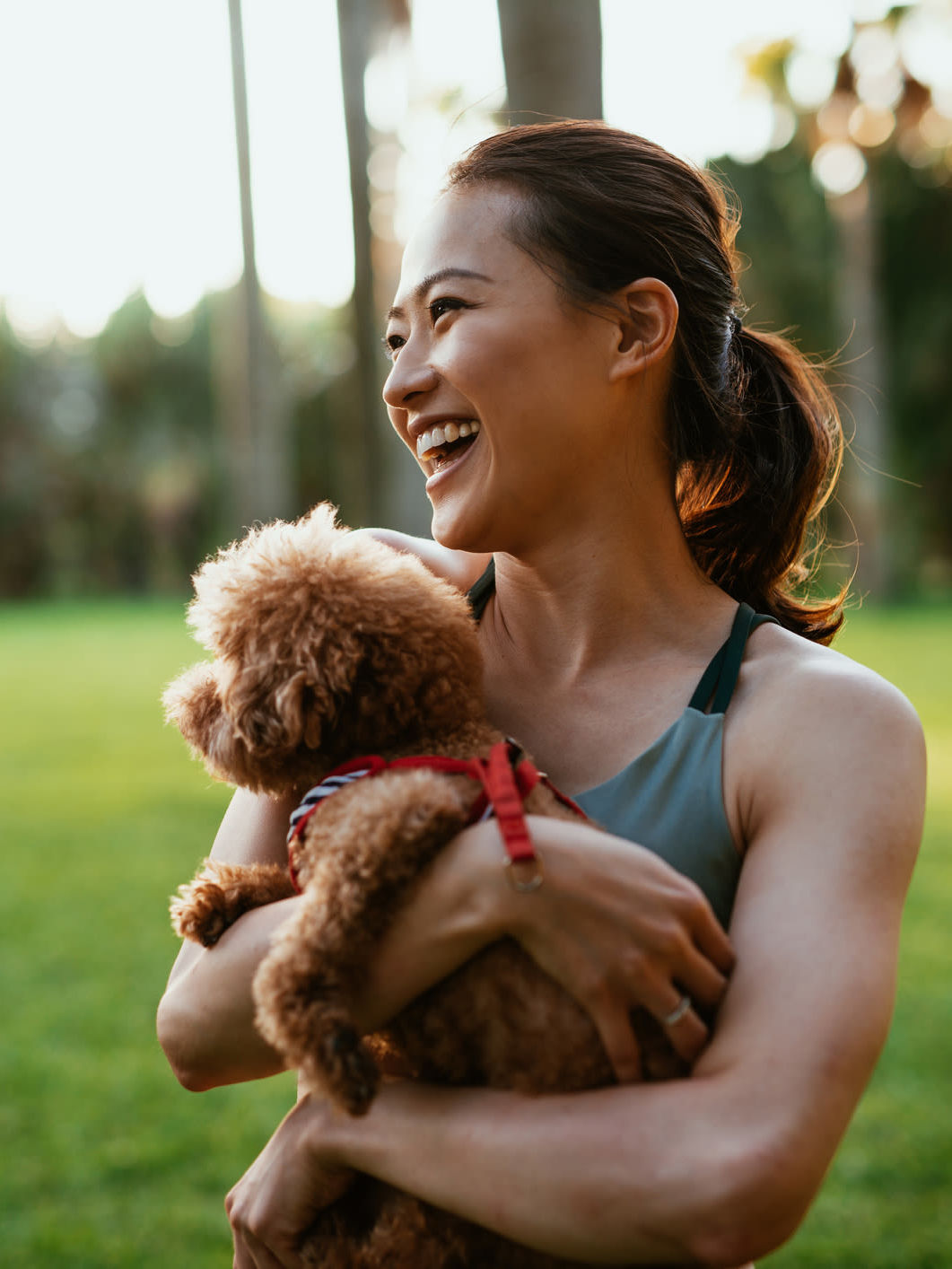 A resident and her dog at a park near Overlook at Flanders in Flanders, New Jersey