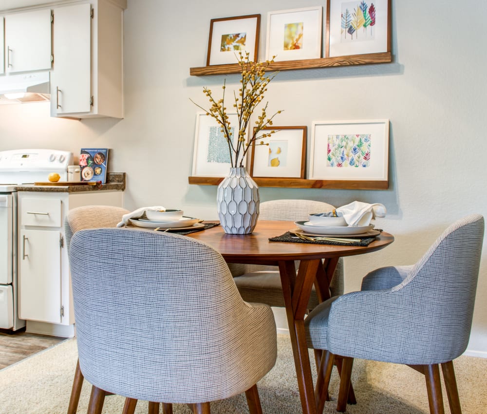 Well-furnished dining area near the kitchen of a model home at Sofi Dublin in Dublin, California