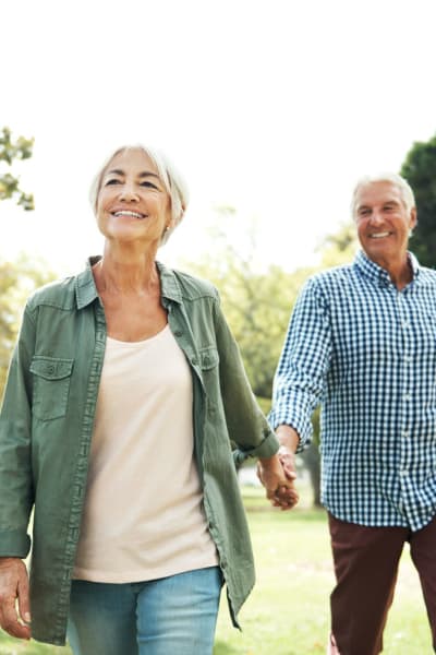Residents walk in a park near Kaitlin Court, Los Angeles, California