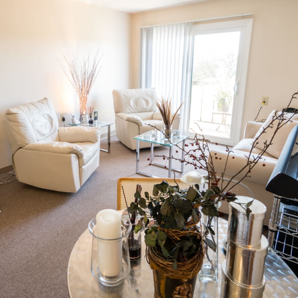 Chic living room in a home at Village Square Apartments in Williamsville, New York