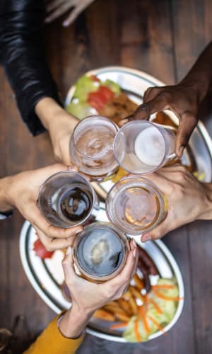 Residents raising a toast at a restaurant near Highland Oaks in Duncanville, Texas