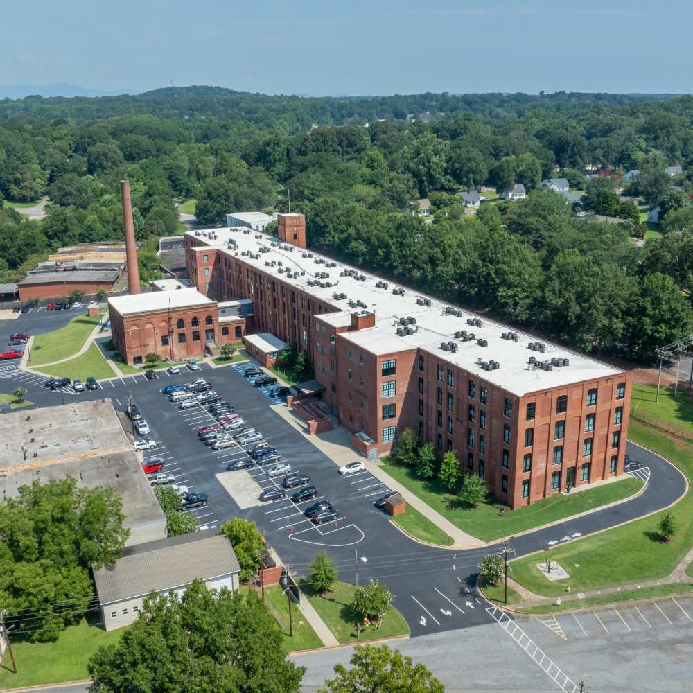 Apartment exterior at Lofts at Inman Mills in Inman, South Carolina