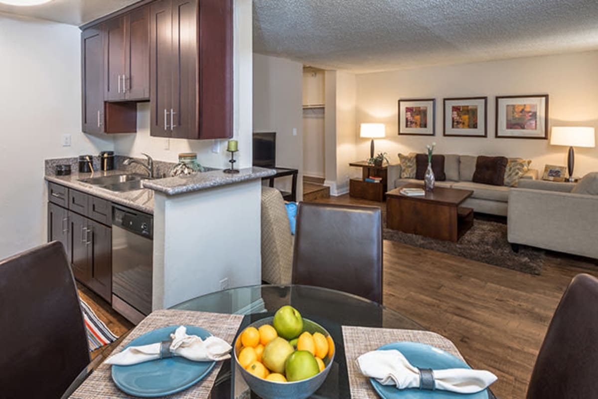 Apartment with dining table at Ariel Court, Los Angeles, California