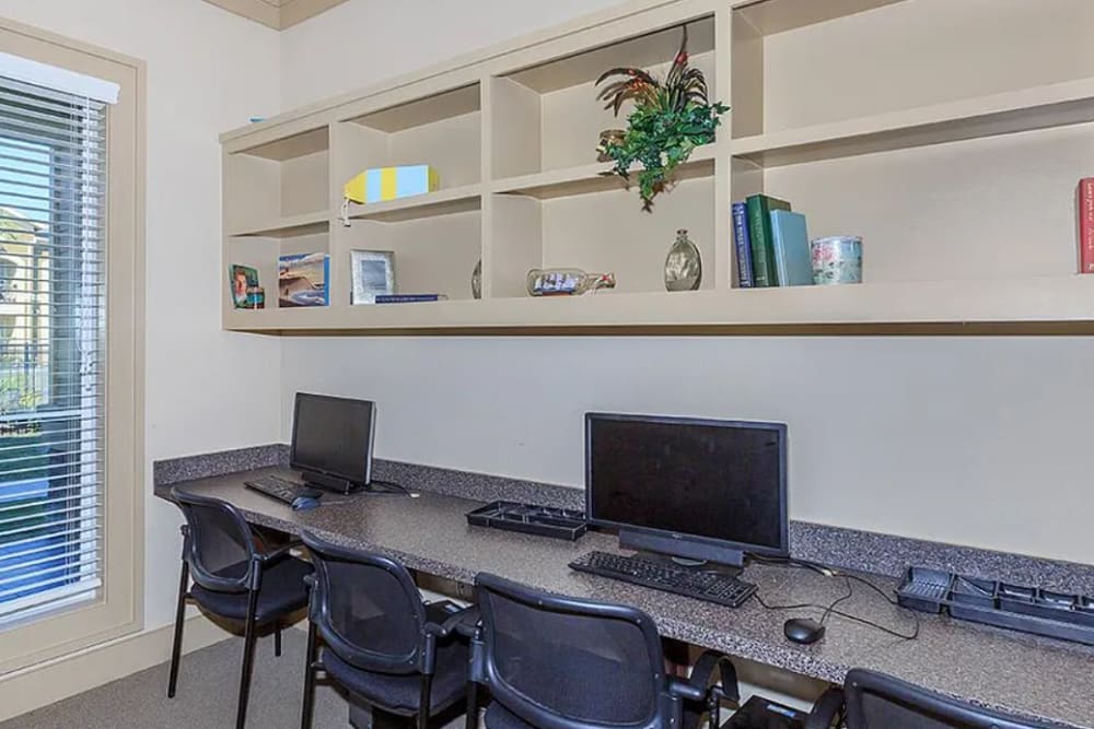 Modern workspace with computers at Villas On Independence in Port Lavaca, Texas