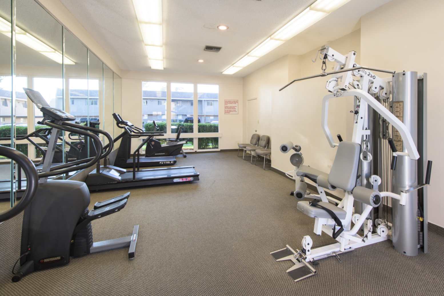 Fitness center with cardio and strength equipment at Livermore Gardens in Livermore, California