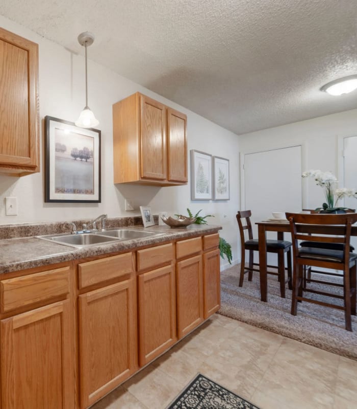 Kitchen with granite countertops at Regency Point Apartments in Tulsa, Oklahoma