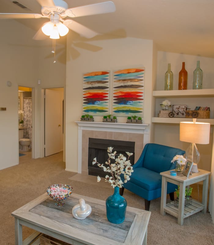 Carpeted living room at The Courtyards in Tulsa, Oklahoma
