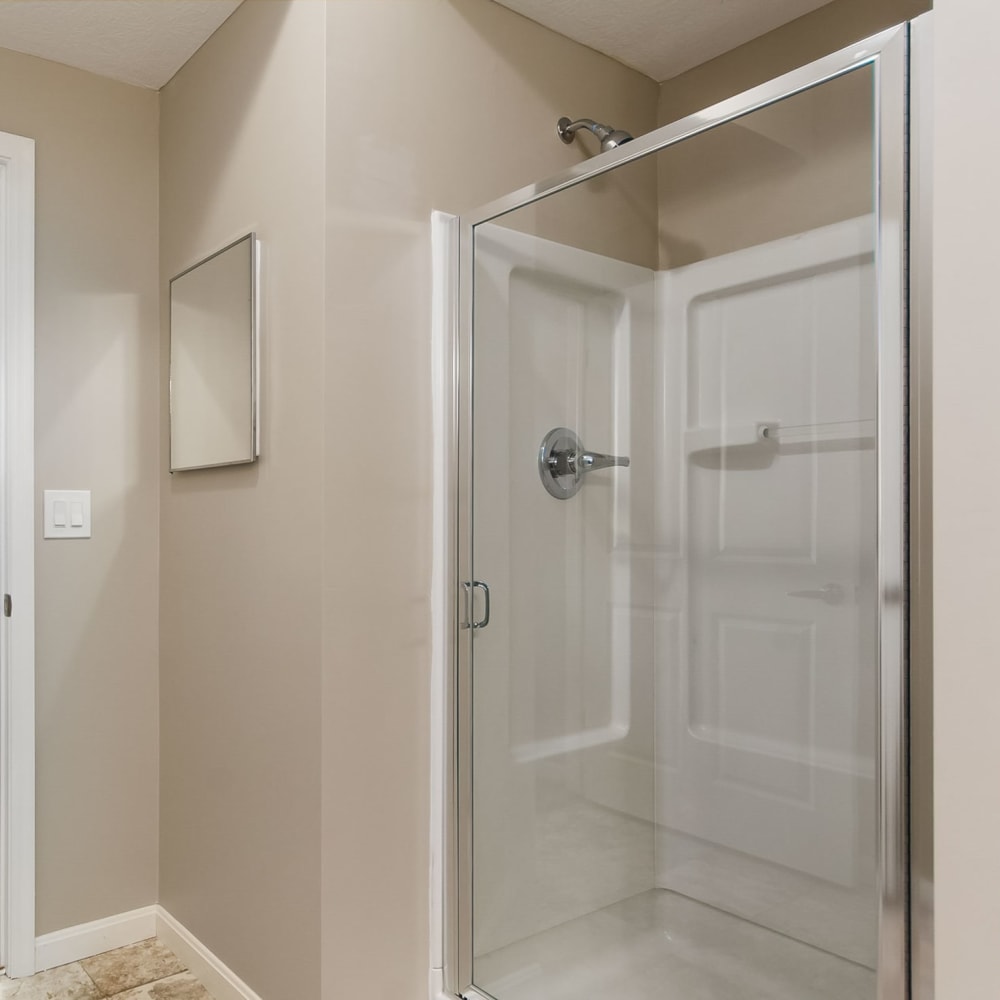 Bath shower with glass door at The Greyson in Hilliard, Ohio