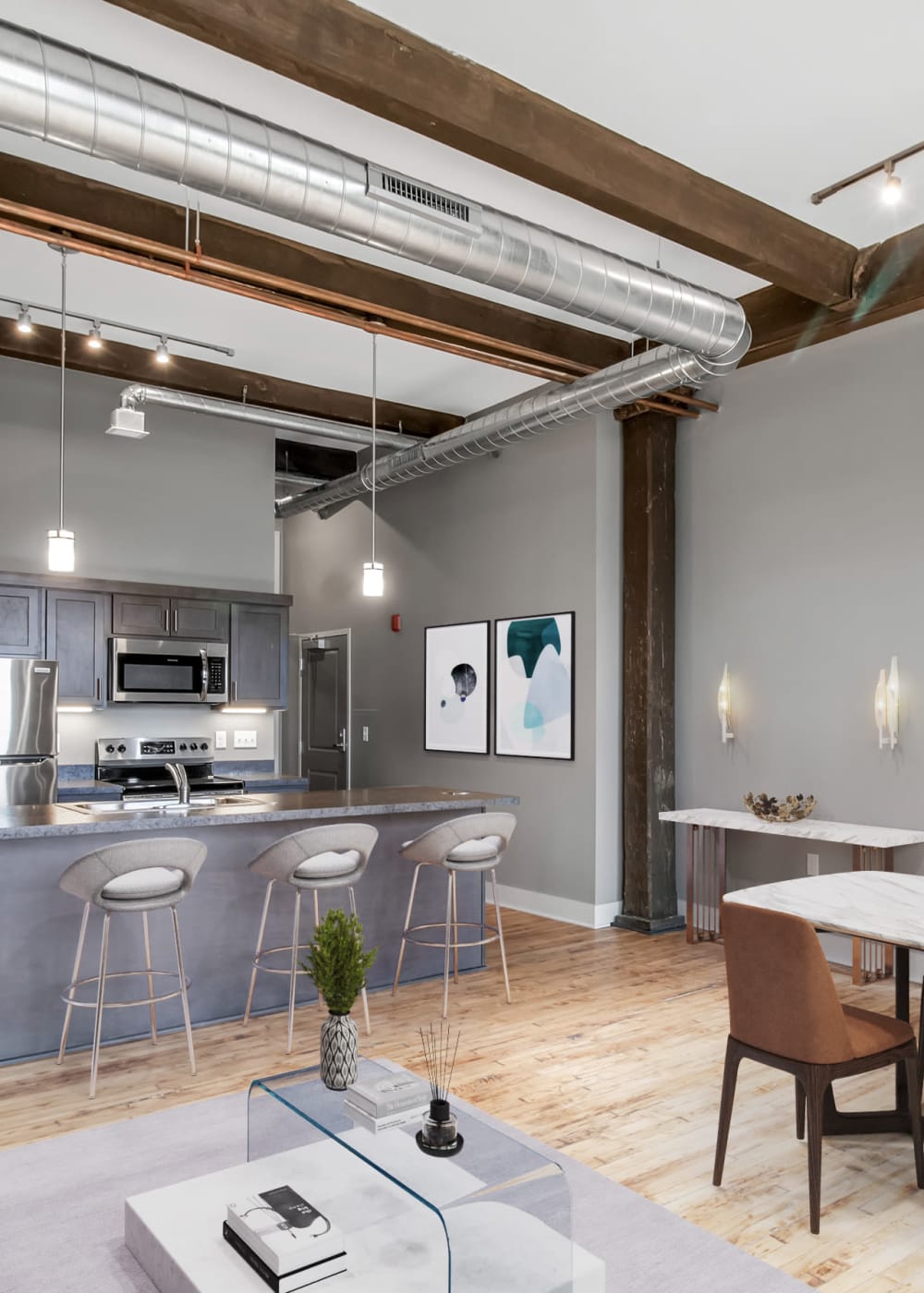 An apartment with an island in the kitchen at Barcalo Living in Buffalo, New York