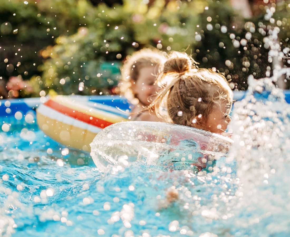 Kids splashing in the pool at Haven Hill Exchange in Atlanta, Georgia