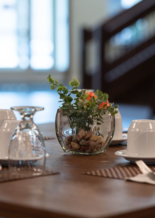 Place setting for 4 in the dining room at The Pillars of Mankato in Mankato, Minnesota