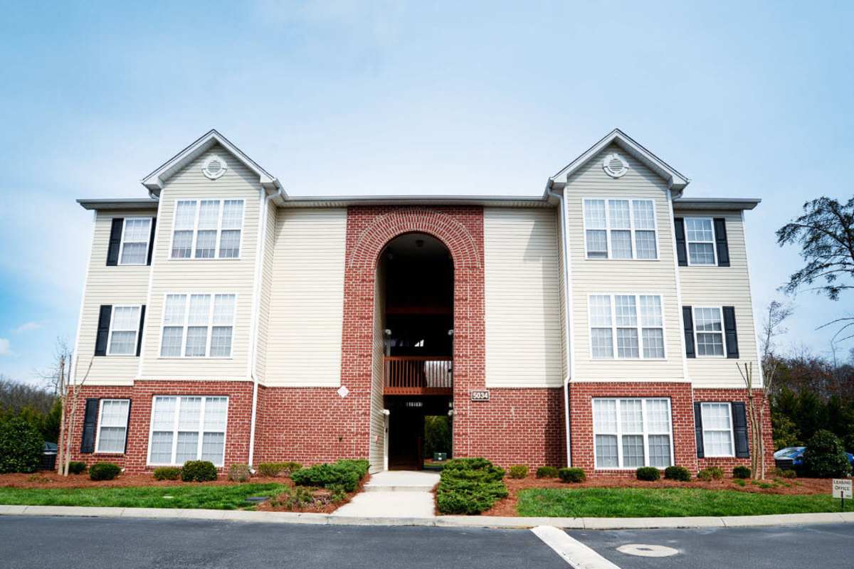 Exterior view of an apartment at Lodge at Lakeshore in Greensboro, North Carolina