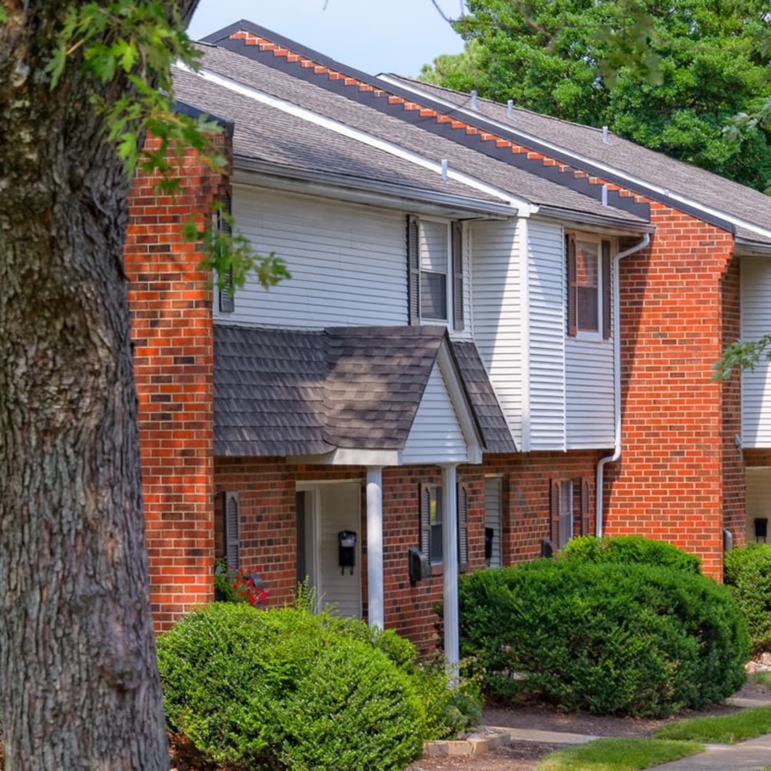 Exterior of an apartment building at Millspring Commons in Richmond, Virginia