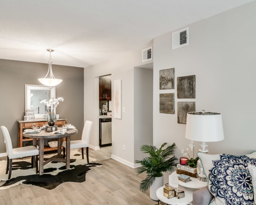Spacious living room and dining room at Pinebrook Apartments in Ridgeland, Mississippi