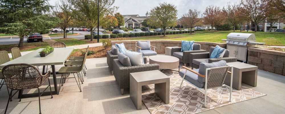 Grilling station and patio lounge room at Crescent Park Commons in Greer, South Carolina