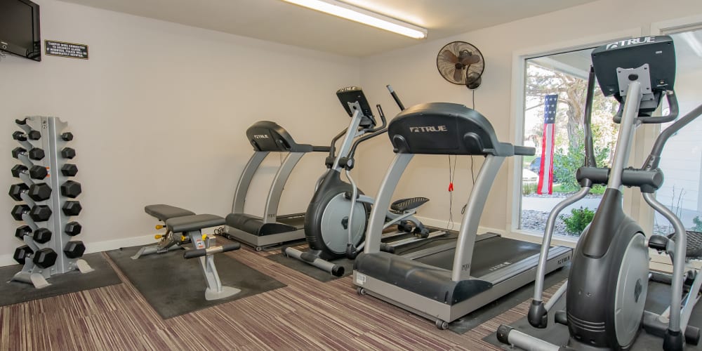 Fully equipped fitness center at Aspen Park Apartments in Wichita, Kansas