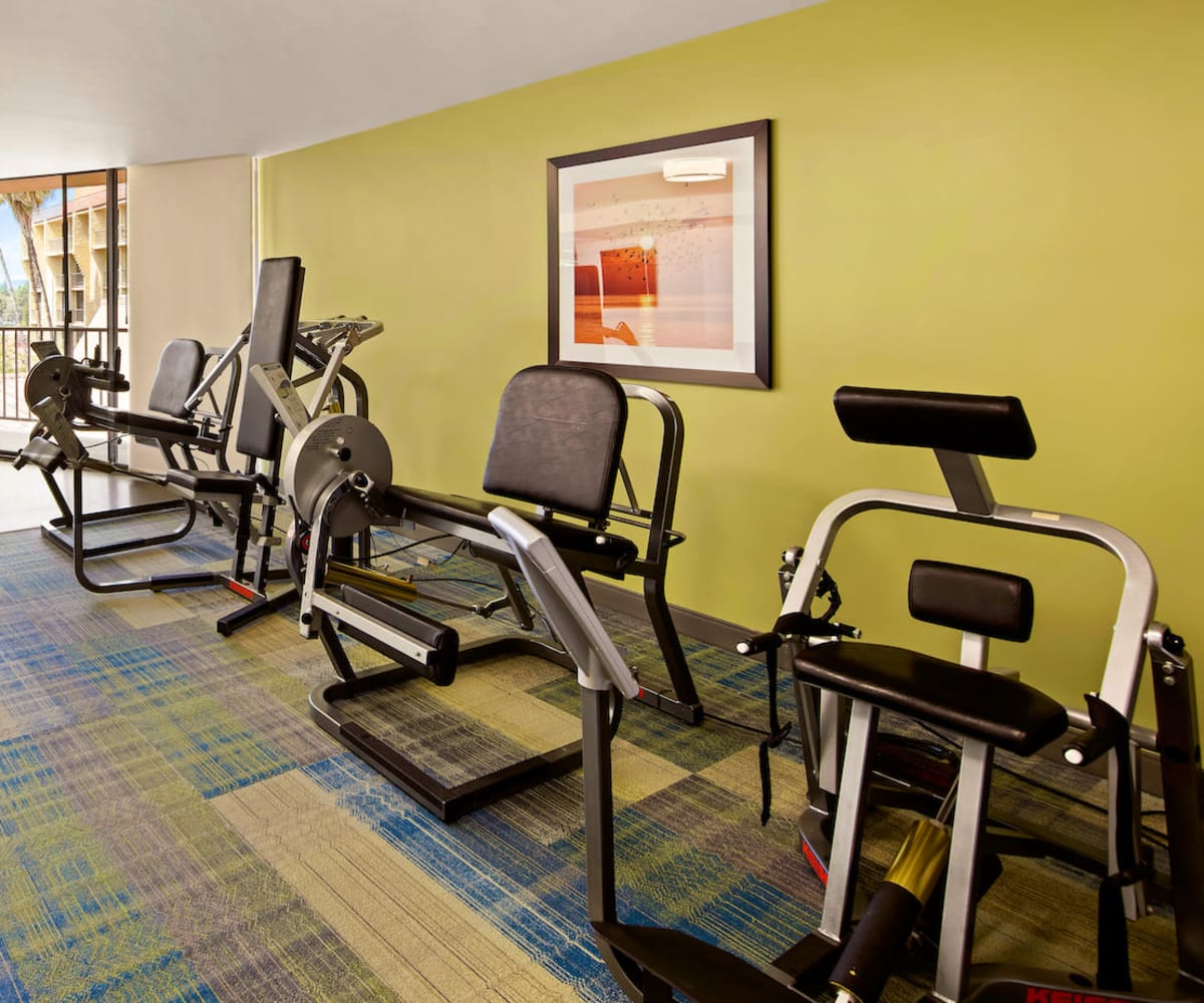 Exercise room with seating in the background at Meridian at Laguna Hills in Laguna Hills, California