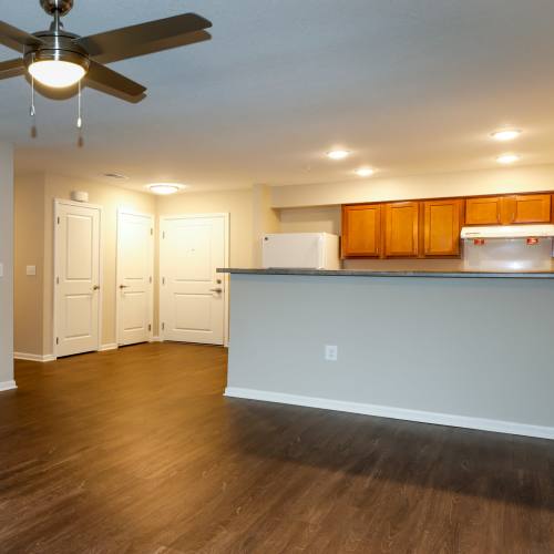 Living area with open concept kitchen at Keyser Greene in Keyser, West Virginia