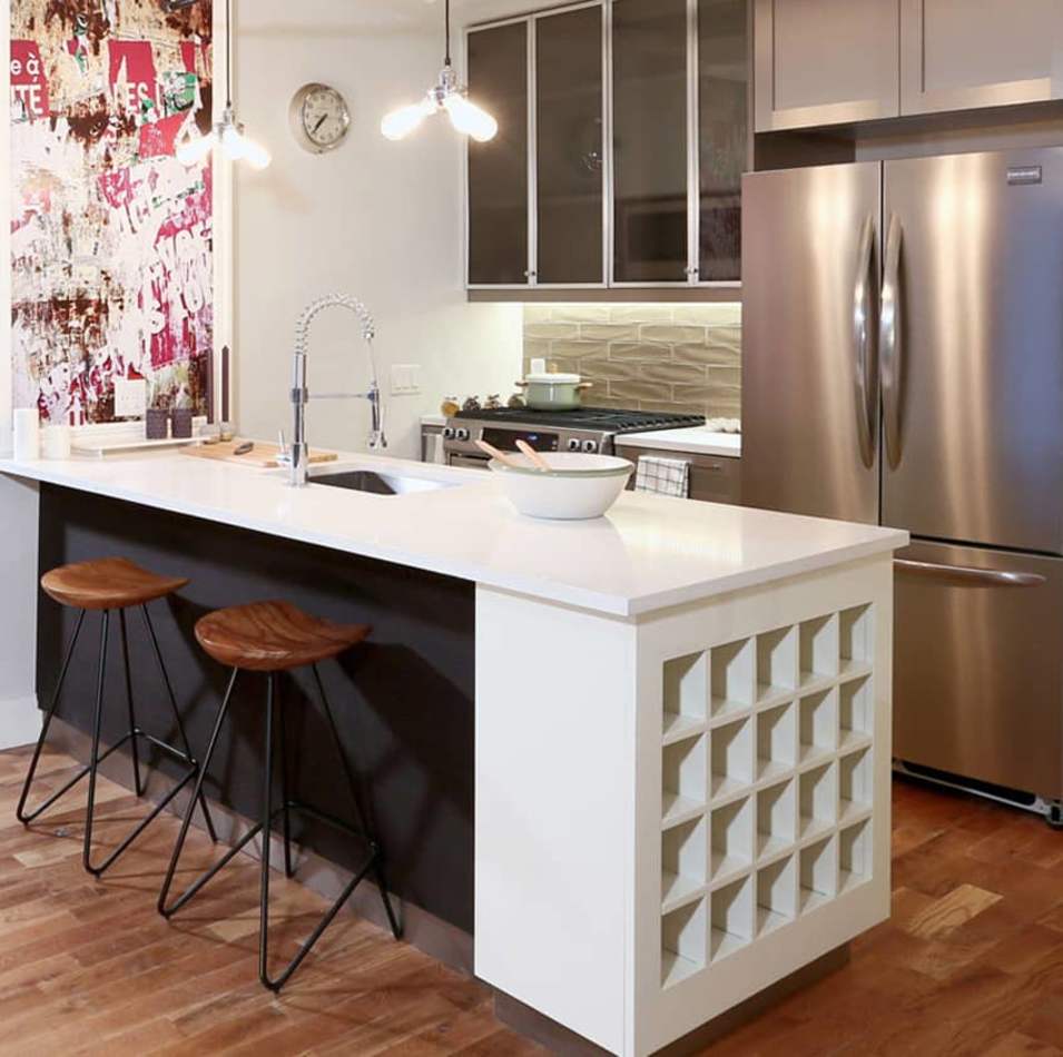Well-designed apartment kitchen with quartz countertops at Leonard Pointe in Brooklyn, New York