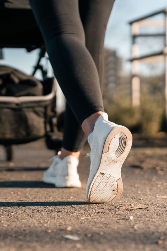 Pushing a stroller at Amber Oaks in Durham, North Carolina