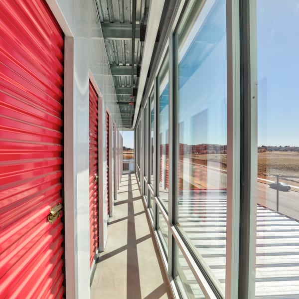 Interior units with bright doors at StorQuest Self Storage in Denver, Colorado