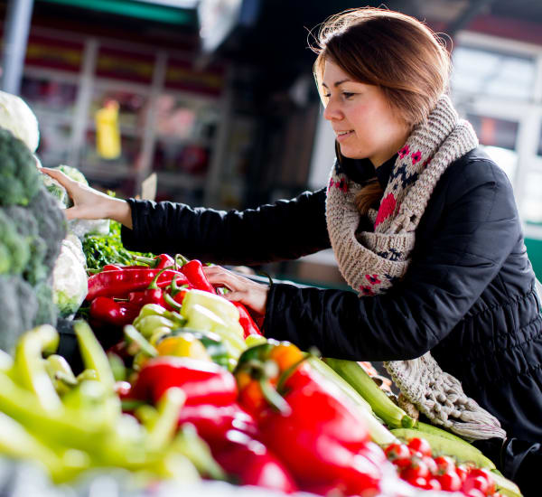 Resident of Grant Park Village getting produce at a local farmers market