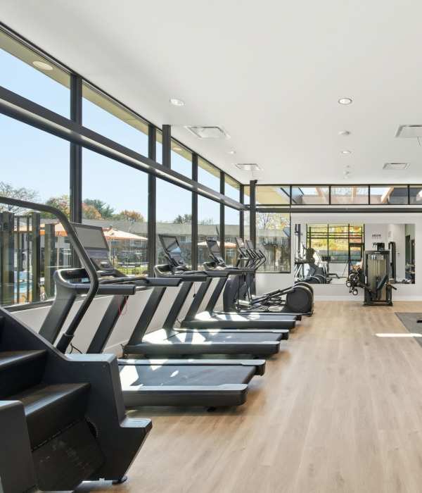 Fitness center at Eagle Rock Apartments at Woodbury in Woodbury, New York