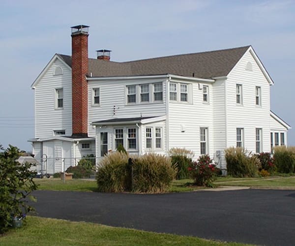 Looking across the road towards a home at Gold Coast in Patuxent River, Maryland