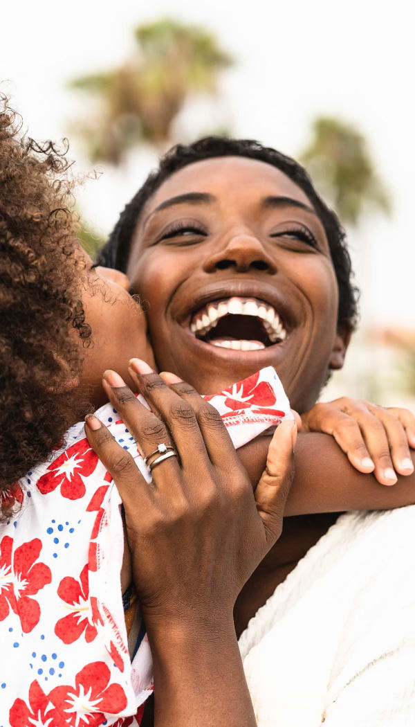 Happy mom and daughter of a Ray Stone Inc. community