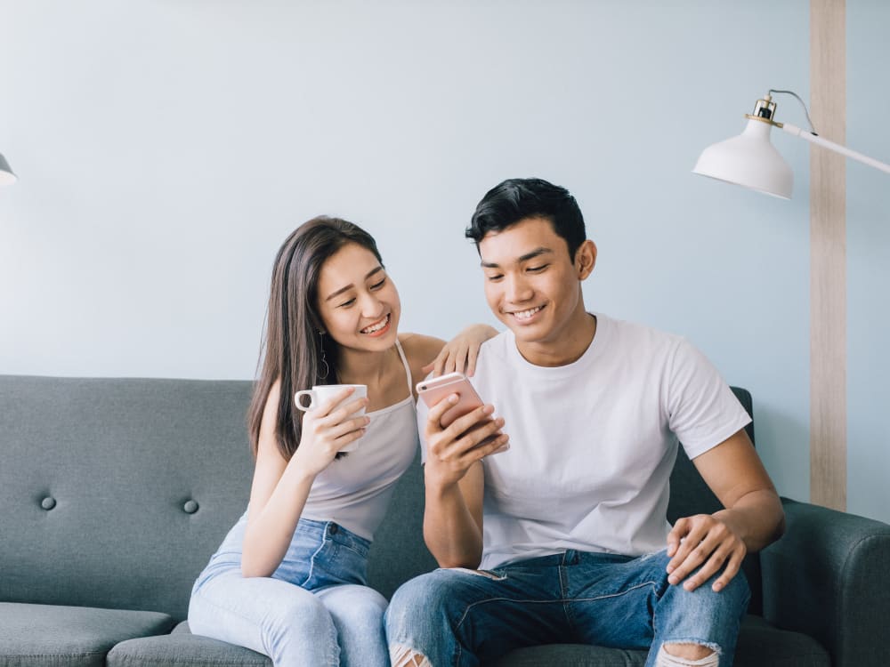 Residents filling out a form on our website using their mobile device at Harbor Point Apartments in Mill Valley, California