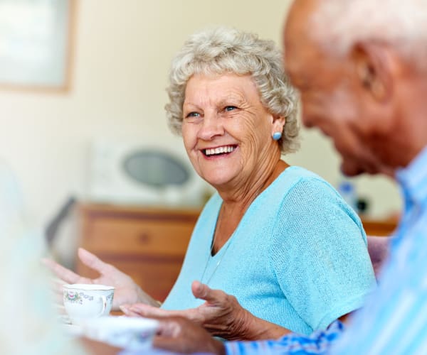 Two residents having a conversation at Trilogy Health Services in Louisville, Kentucky