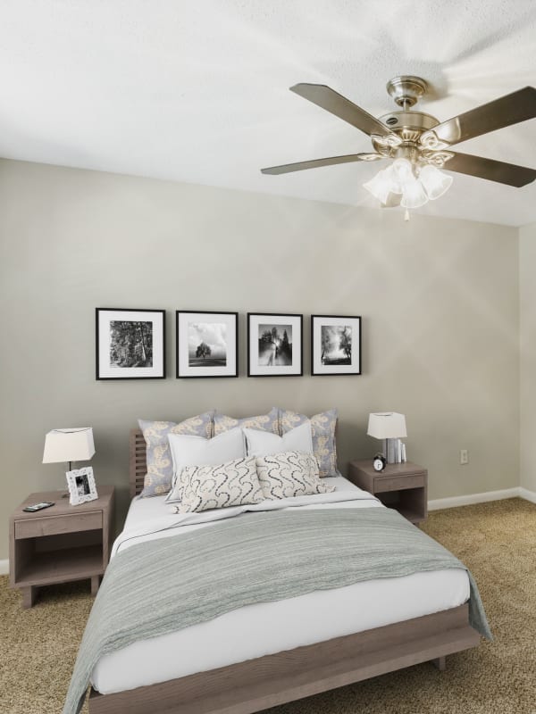 Bedroom with a ceiling fan at The Greens At Braelinn in Peachtree City, Georgia