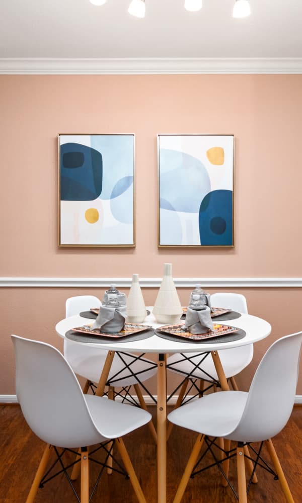 Dining area with photo frame at The Abbey At Enclave in Houston, Texas