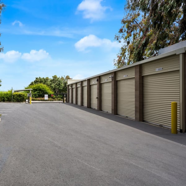 Outdoor drive-up self storage units at StorQuest Self Storage in Redwood City, California