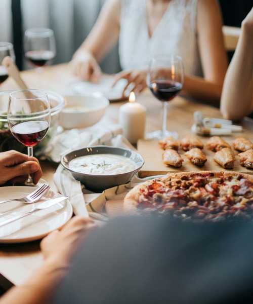 Residents dining at a restaurant near The Bergamot Apartments On 780 in Sarasota, Florida